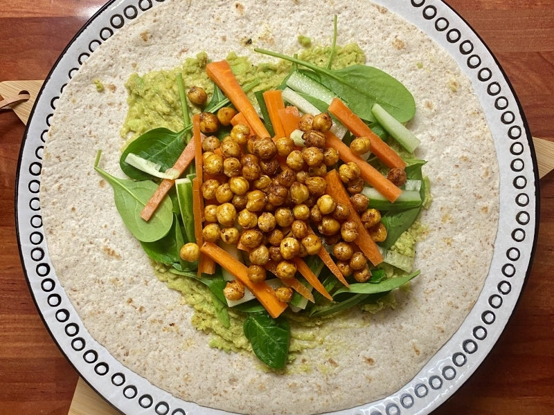 Healthy avocado chickpea wrap recipe rich in plant based protein and fiber